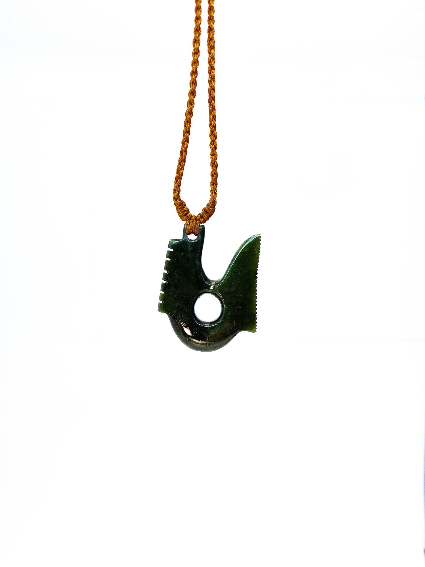 New Zealand Pounamu Fish hook inspired by precolombian design