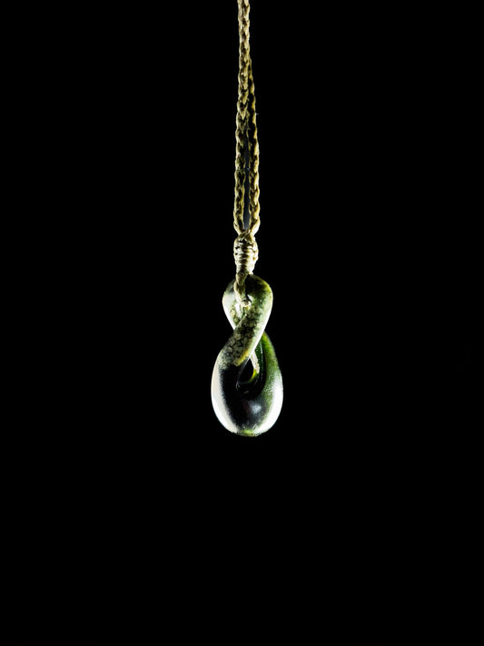 Pounamu Pikorua Twist on plain background
