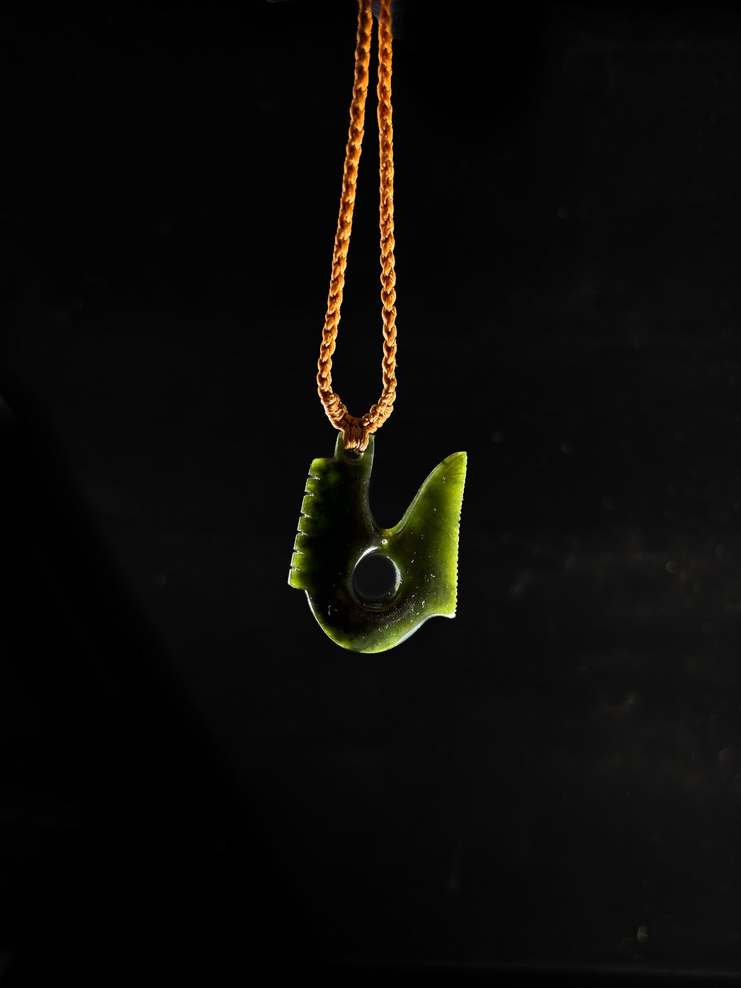 New Zealand Pounamu Fish hook inspired by precolombian design