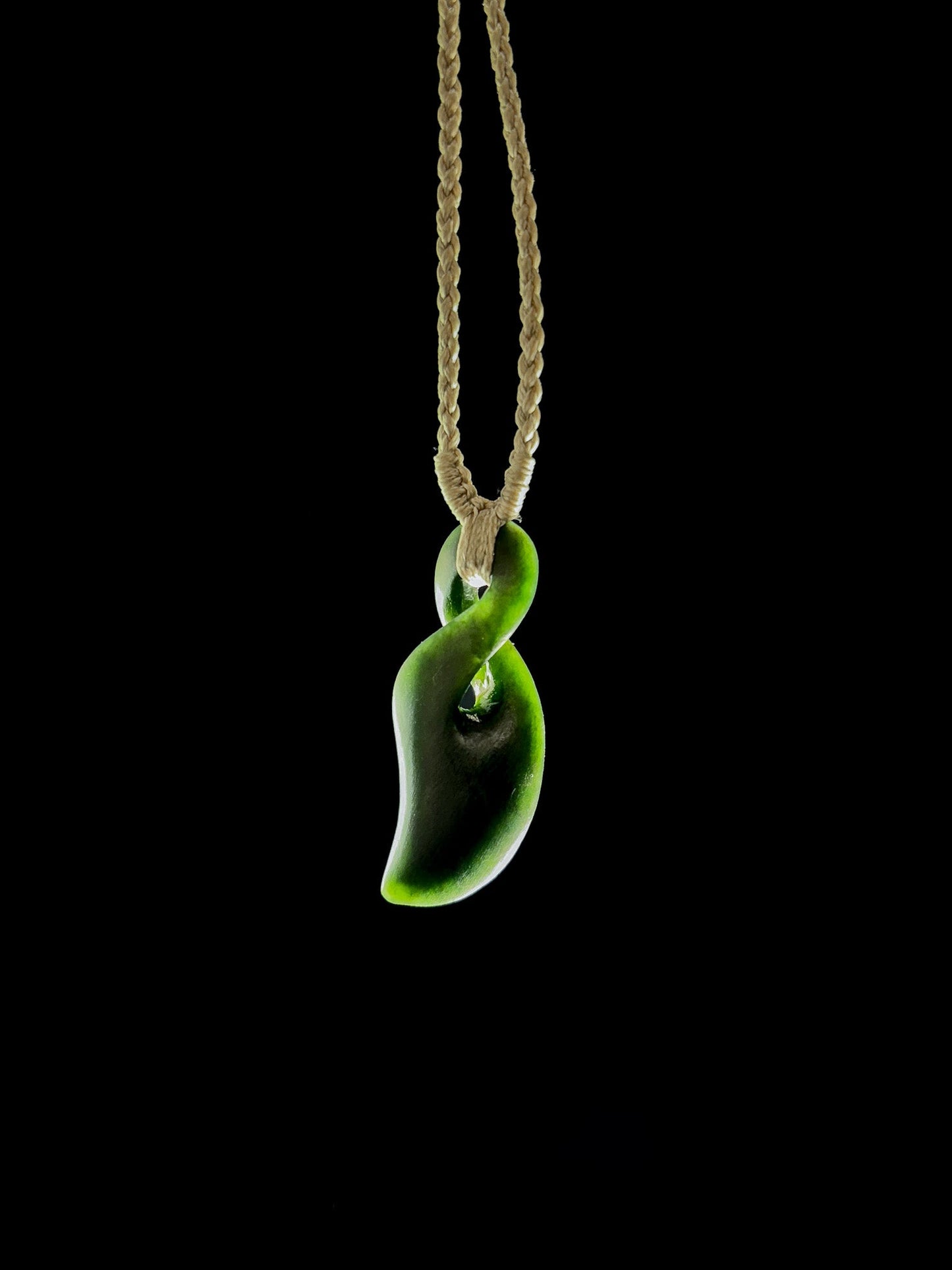 Pikorua Pounamu Pendant on Black background