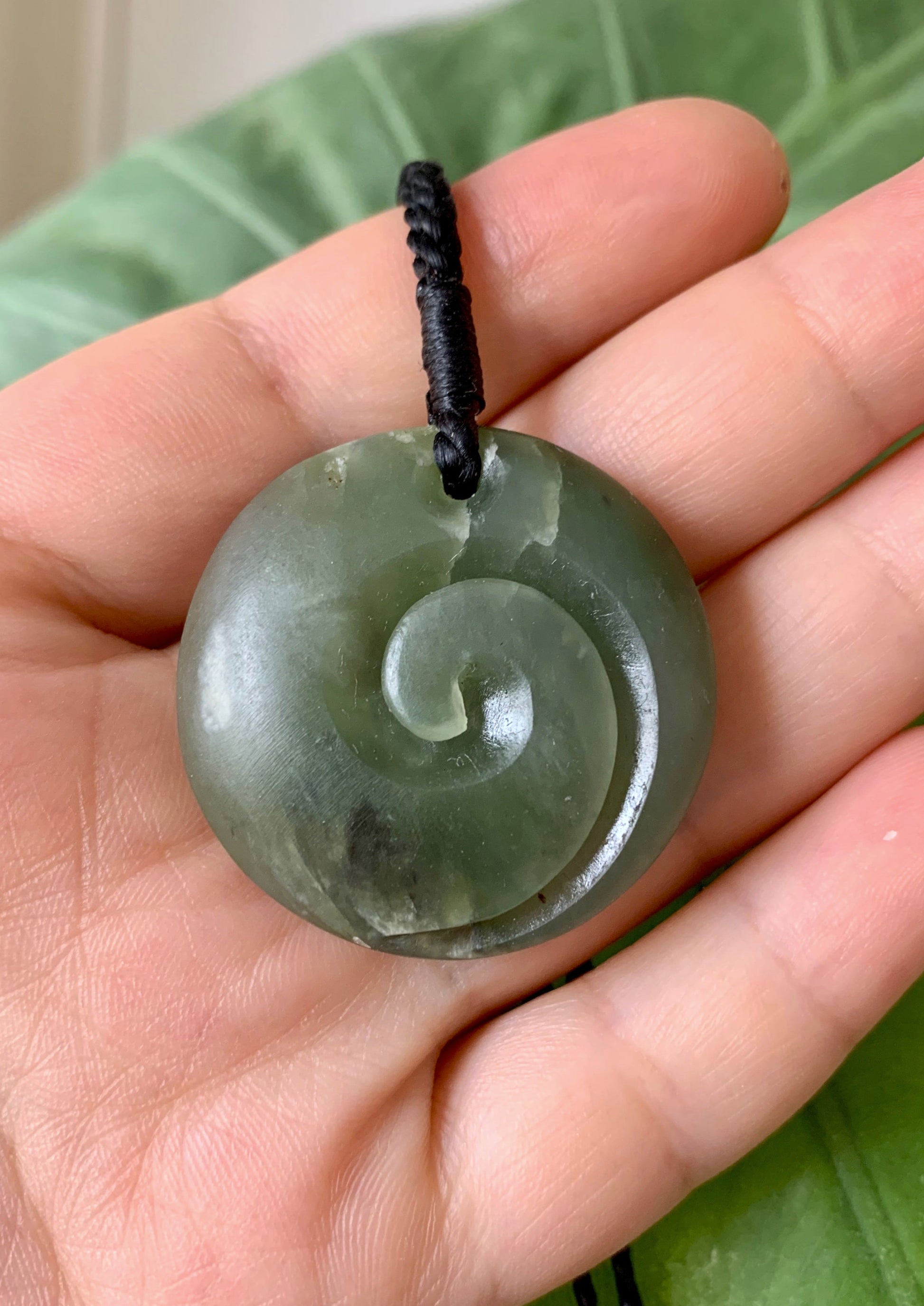 Pounamu pendant in natural light